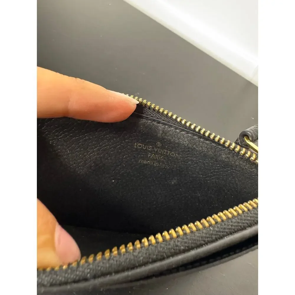 Louis Vuitton | Mélanie Pochette – Monogram Empreinte Leather